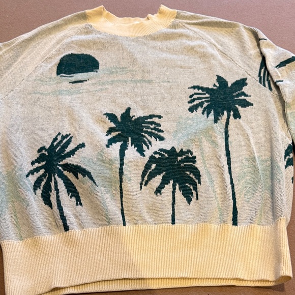 THE GREAT. Striped Knit Sweater in Cream and Green - Picture 1 of 5